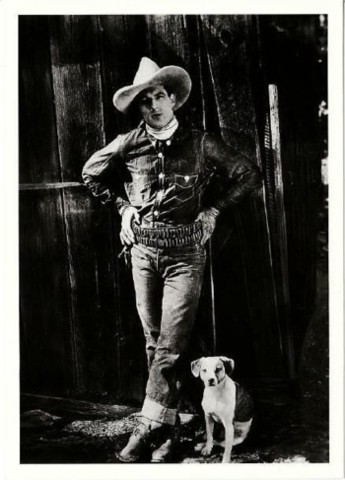 Tom Tyler with a small dog black and white European trading card
